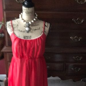 Fun and fancy red empire waist holiday dress.